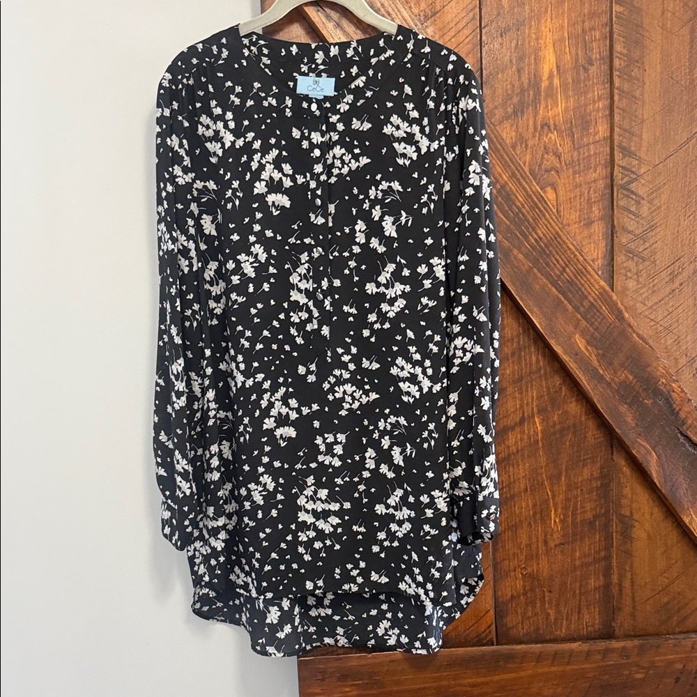 CeCe Black Blouse with White Floral Design